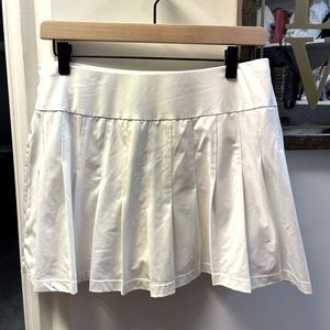 White Pleated Tail Tennis Skirt